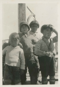 Image of Four Eskimo [Inuit] boys aboard